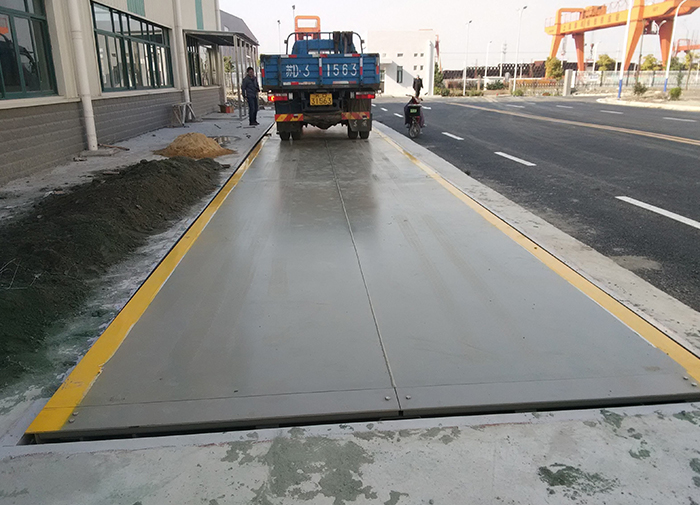 Electronic truck scale weighing system